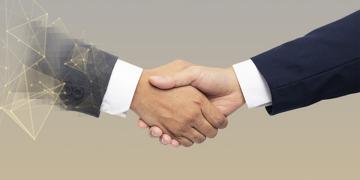 Two business men shaking hands. Left side is digital with pixels and patterns.